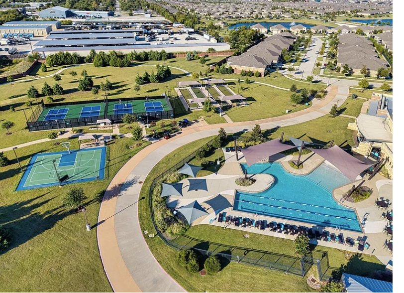 Master-planned community amenity center, pools and sports courts
